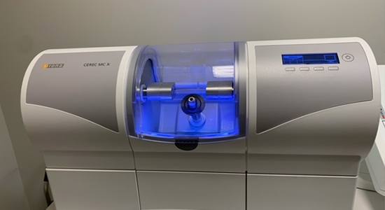 CEREC in office dental restoration milling unit