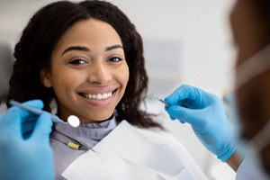 Woman smiling during dental checkup