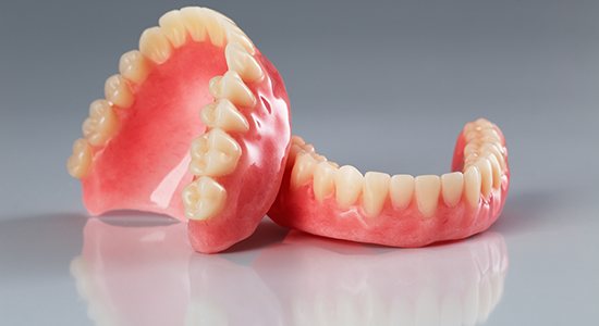 Full set of natural looking dentures