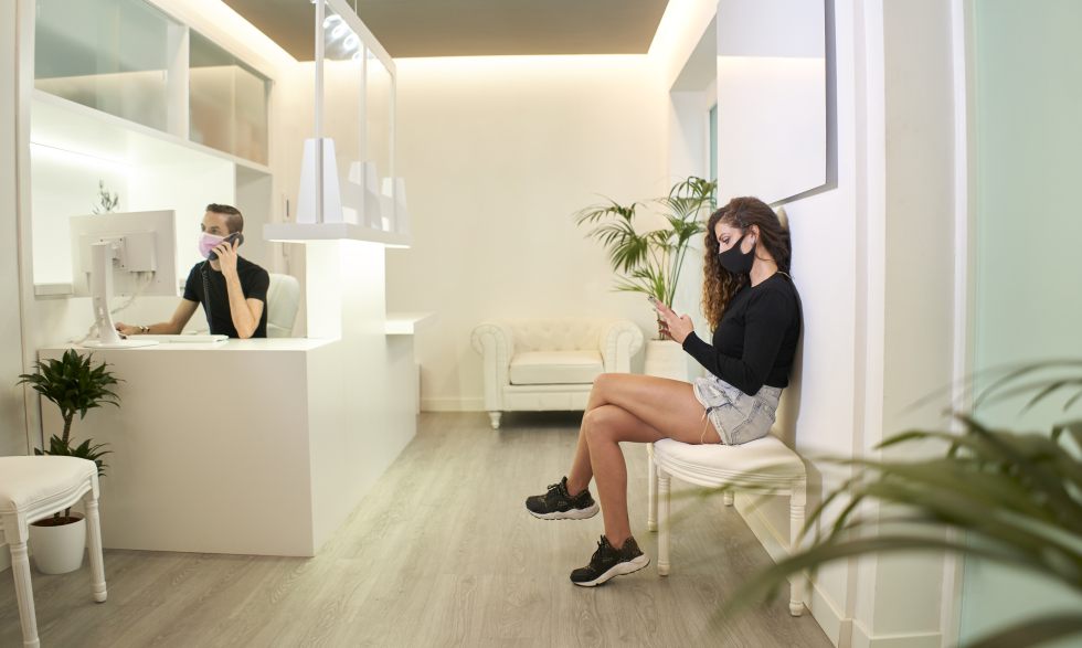 Person in dental office waiting room