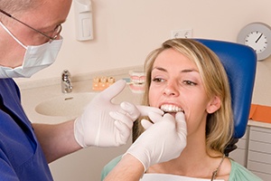 a patient during her Invisalign appointment