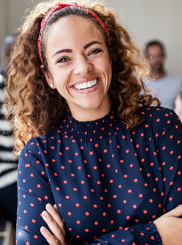 Woman with healthy smile after tooth colored filling