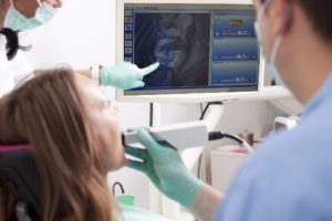 Dentist capturing digital impressions