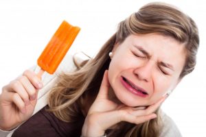 woman Popsicle tooth sensitivity