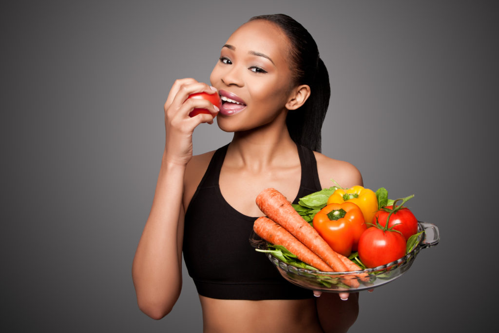 healthy woman knows what to eat to avoid dental emergencies