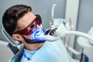 Patient getting teeth whitened.